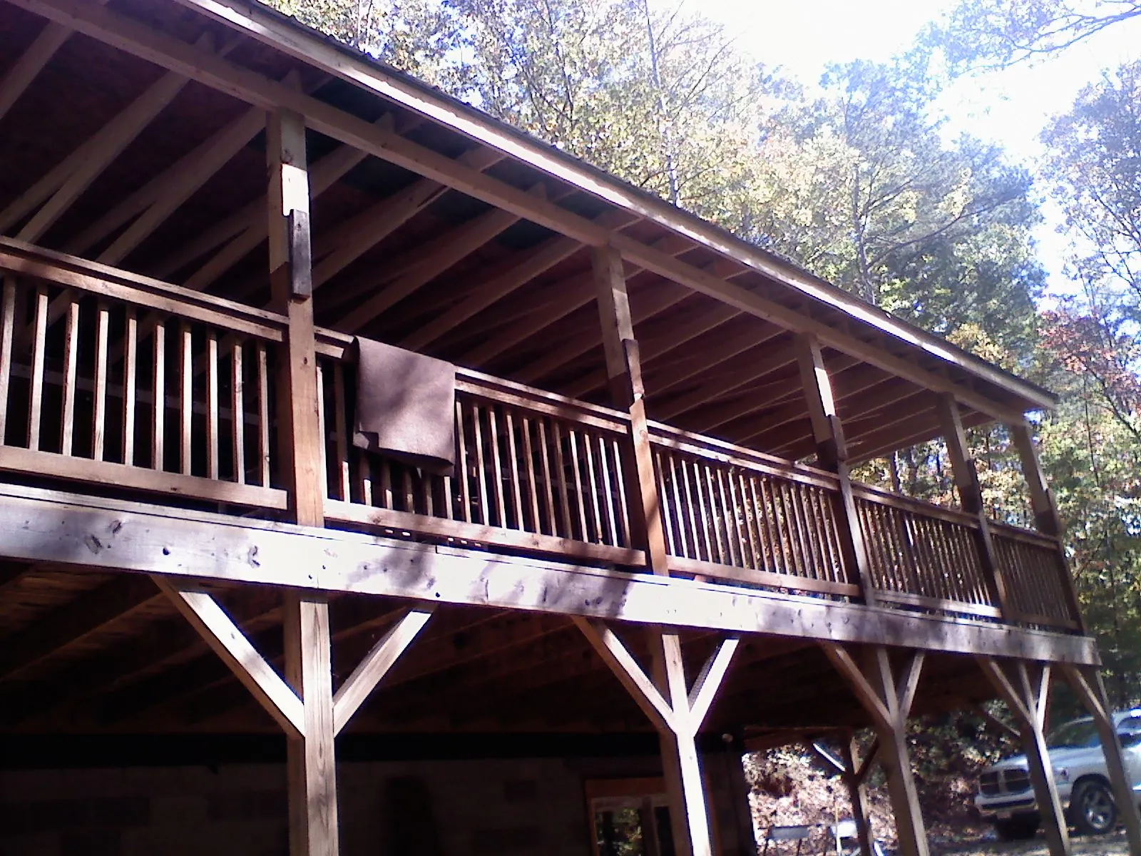 Timber framing under a new elevated porch and deck — Roof Leak Repair in Batavia by Roofing Brothers